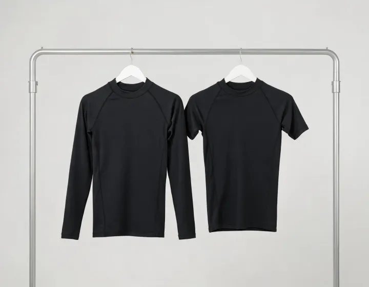 Plain BJJ rash guards in sleeve and panel variations